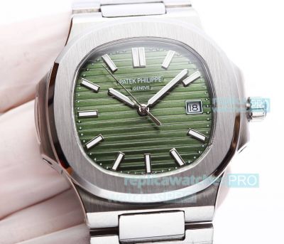 JH Factory Replica Patek Philippe Nautilus Green Dial SS Bezel Men 42.5MM Watch